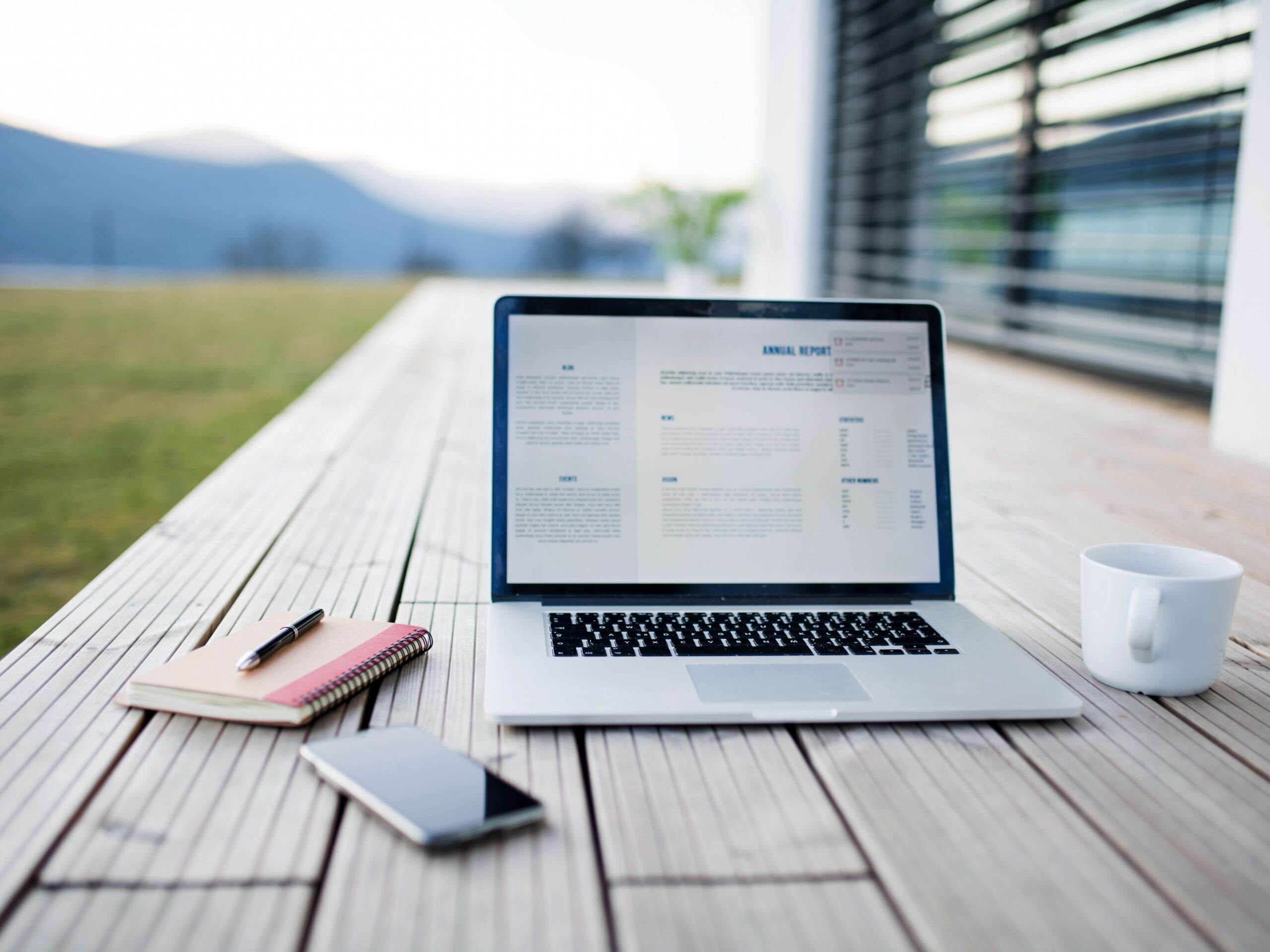 Laptop outside showing the best platform for a small business website on the screen
